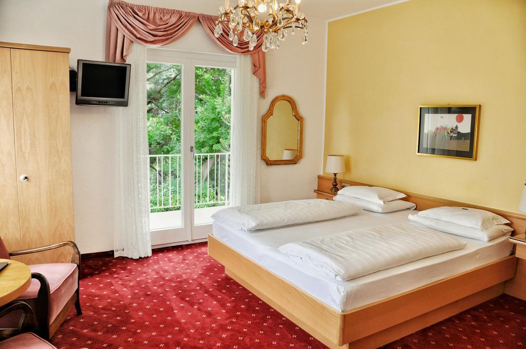 Hotel Zima Merano Rum bild